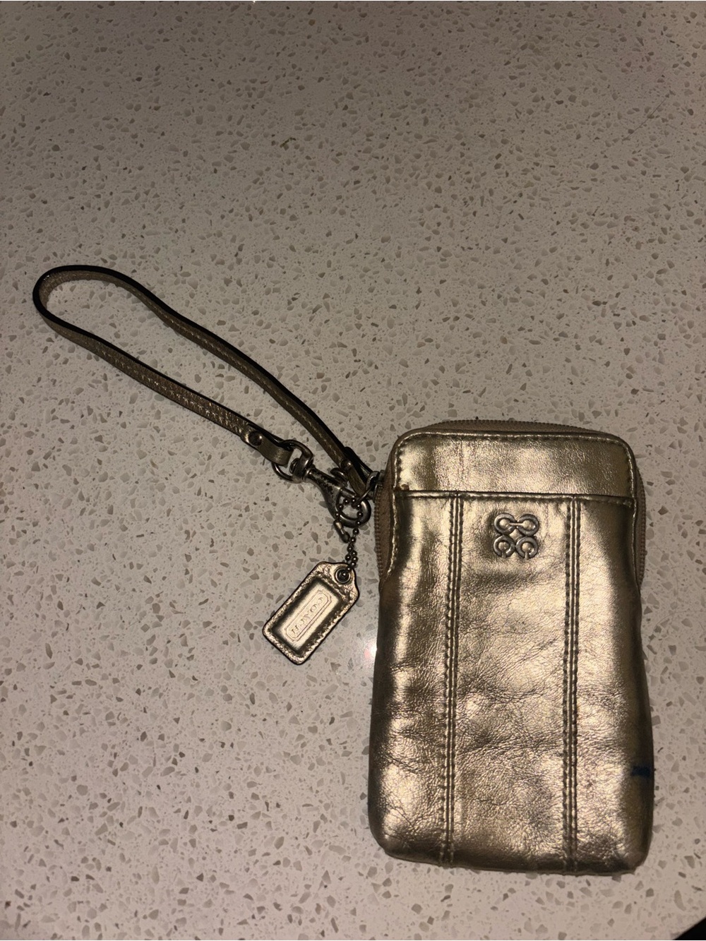 Coach Metallic Gold Leather Wristlet Phone Case